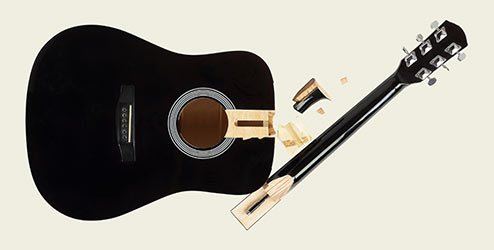 Guitare réparée avec notre Super Super Glue